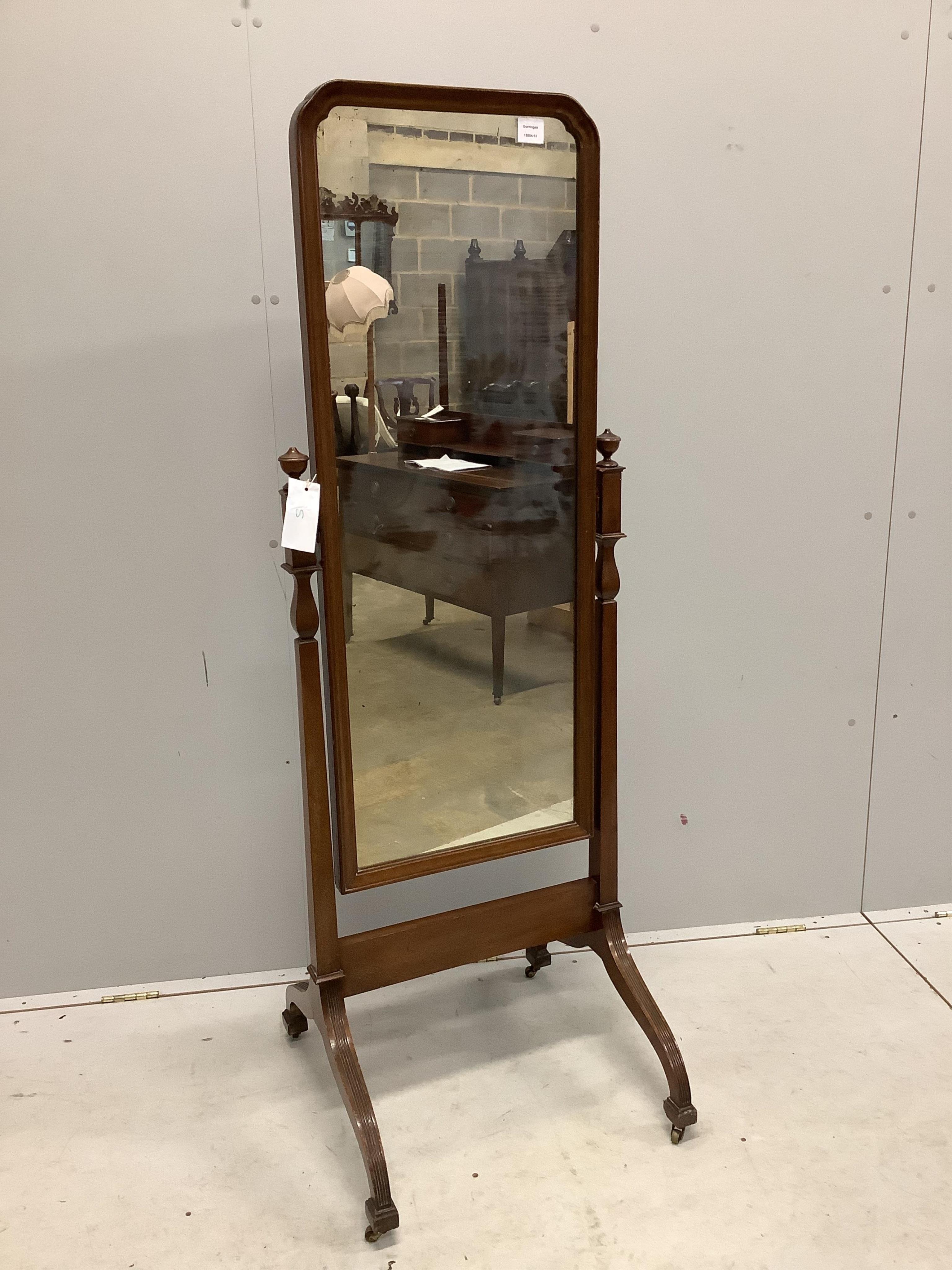 An early 20th century mahogany cheval mirror with moulded frame and reeded down swept legs, width 54cm, height 159cm. Condition - fair